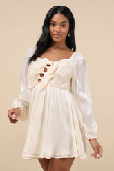 Playful Delight Champagne Bow-Front Long Sleeve Mini Dress