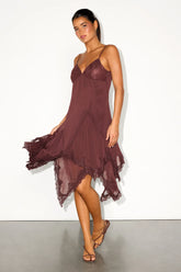 Exquisitely crafted to make an elegant entrance, this airy woven dress charms everyone with its naturally romantic essence. A floral burnout design sweeps across the figure-skimming silhouette, falling from adjustable straps into a twist-front bodice