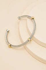 Avira Silver and Gold Twisted Rhinestone Bangle Bracelet